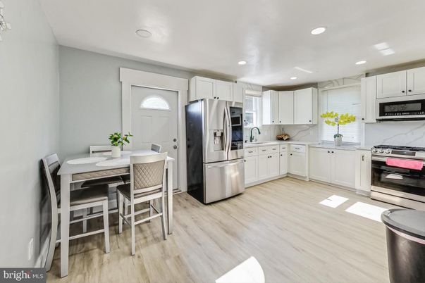 Dining room, Interior, Kitchen, Recessed Lighting, Stainless Steel Appliances, Wood Texture Flooring