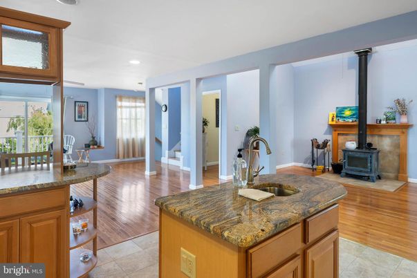 Fireplace, Interior, Kitchen, Recessed Lighting, Wood Texture Flooring