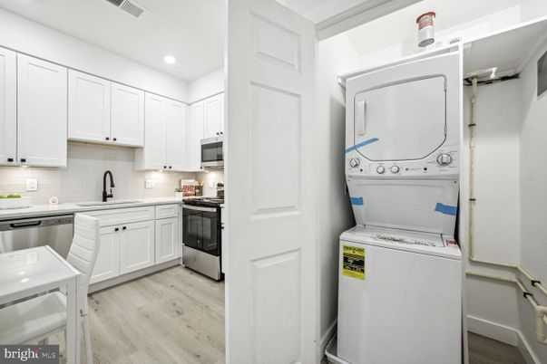 Interior, Kitchen, Recessed Lighting, Utility Closets, Washer, Wood Texture Flooring