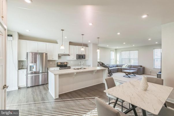 Dining room, Interior, Kitchen, Living room, Pendant Lights, Recessed Lighting, Stainless Steel Appliances, Wood Texture Flooring
