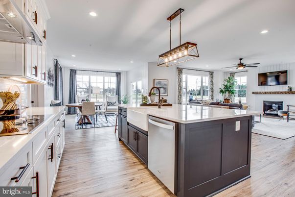 Dining room, Fireplace, Interior, Kitchen, Pendant Lights, Recessed Lighting, Wood Texture Flooring