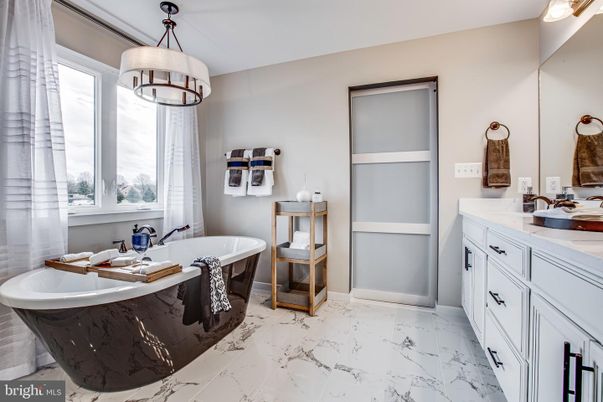 Bathroom, Dual Sink Vanities, Free Standing Baths, Interior, Marble, Pendant Lights