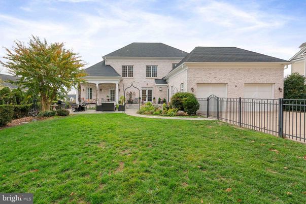Attached, Backyard, Exterior, Facade, Brick Facade, French Provincial