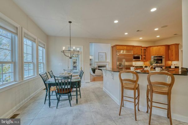 Chandelier, Dining room, Fireplace, Interior, Kitchen, Pendant Lights, Recessed Lighting, Stainless Steel Appliances