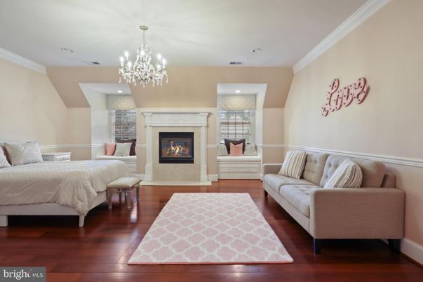 Bedroom, Chandelier, Fireplace, Interior, Living room, Recessed Lighting, Wood Texture Flooring