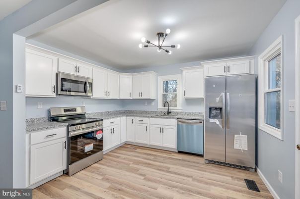 Interior, Kitchen, Pendant Lights, Stainless Steel Appliances, Wood Texture Flooring