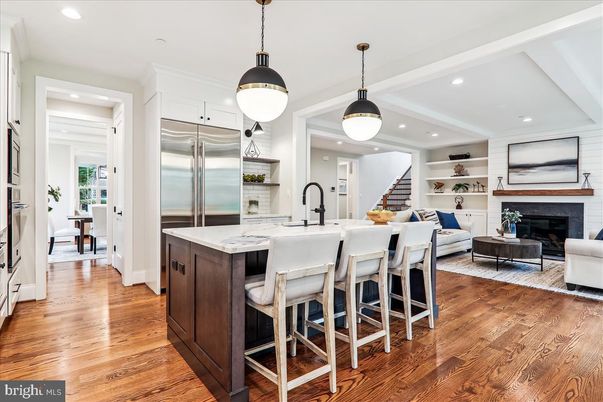 Fireplace, Interior, Kitchen, Living room, Pendant Lights, Recessed Lighting, Stainless Steel Appliances, Wood Texture Flooring