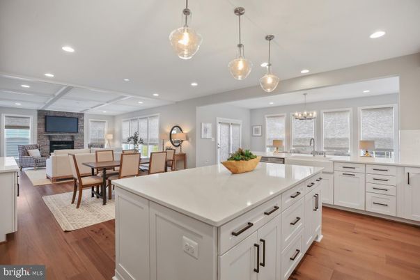 Chandelier, Dining room, Fireplace, Interior, Kitchen, Living room, Pendant Lights, Recessed Lighting, Wood Texture Flooring
