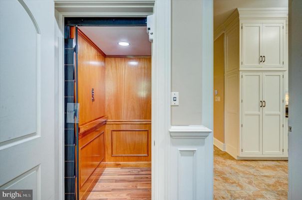 Elevator, Interior, Recessed Lighting, Wood Texture Flooring, Wooden Walls