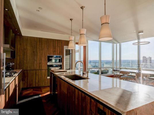 Dining room, Interior, Kitchen, Pendant Lights, Recessed Lighting, Stainless Steel Appliances, Water, Wood Texture Flooring