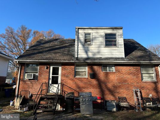 Exterior, Facade, Brick Facade, Cape Cod