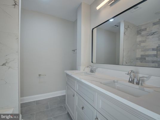 Bathroom, Dual Sink Vanities, Interior, Marble Walls, Recessed Lighting