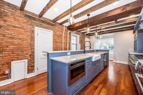 Interior, Kitchen, Pendant Lights, Recessed Lighting, Stainless Steel Appliances, Stone Walls, Wooden Beams, Wood Texture Flooring