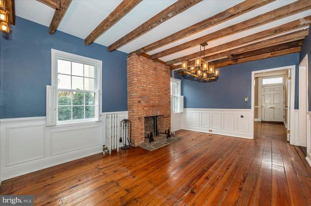 Chandelier, Empty room, Fireplace, Interior, Stone Walls, Wooden Beams, Wood Texture Flooring