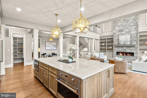 Dining room, Fireplace, Interior, Kitchen, Living room, Pendant Lights, Recessed Lighting, Stone Walls, Wood Texture Flooring