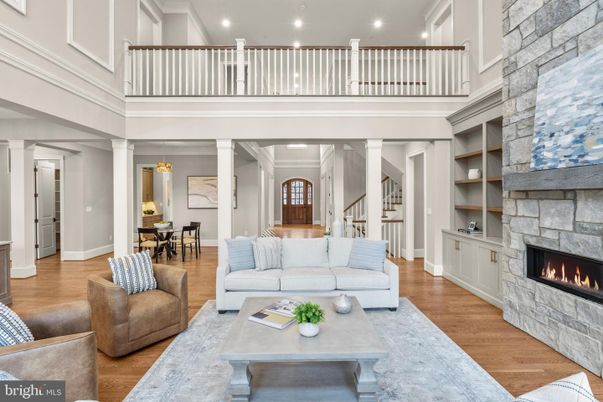 Dining room, Fireplace, Interior, Living room, Recessed Lighting, Wood Texture Flooring