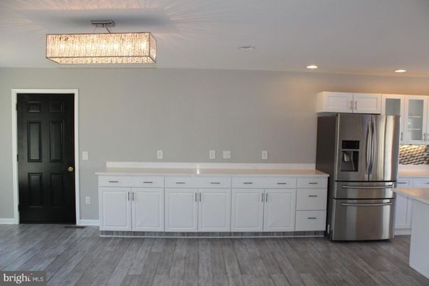 Chandelier, Interior, Kitchen, Recessed Lighting, Stainless Steel Appliances, Wood Texture Flooring