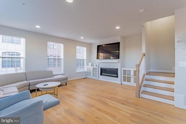Fireplace, Interior, Living room, Recessed Lighting, Wood Texture Flooring