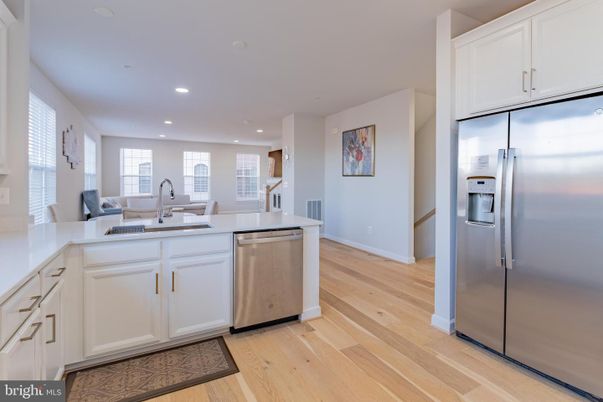 Dining room, Interior, Kitchen, Recessed Lighting, Stainless Steel Appliances, Wood Texture Flooring