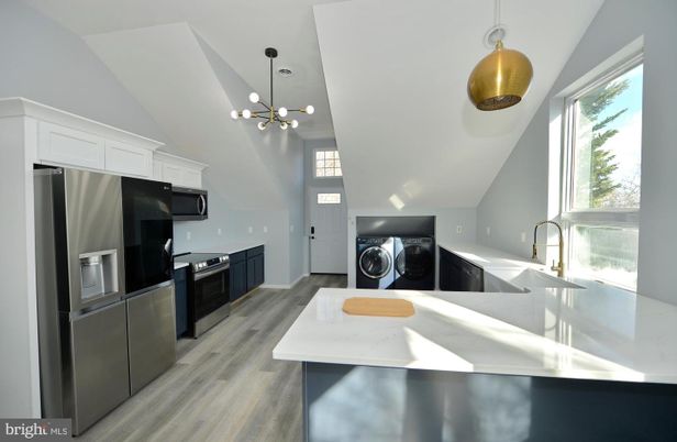 Interior, Kitchen, Pendant Lights, Stainless Steel Appliances, Washer, Wood Texture Flooring