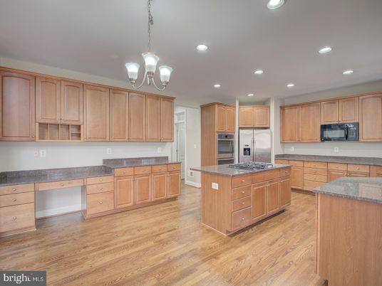 Chandelier, Interior, Kitchen, Pendant Lights, Recessed Lighting, Stainless Steel Appliances, Wood Texture Flooring