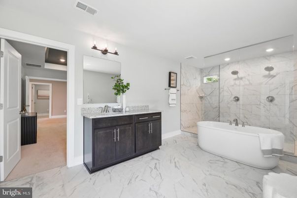 Bathroom, Dual Sink Vanities, Free Standing Baths, Interior, Marble, Marble Walls, Recessed Lighting
