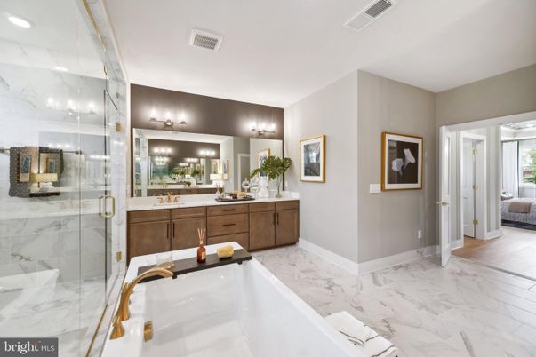 Bathroom, Dual Sink Vanities, Glass Shower, Interior, Marble, Marble Walls, Recessed Lighting