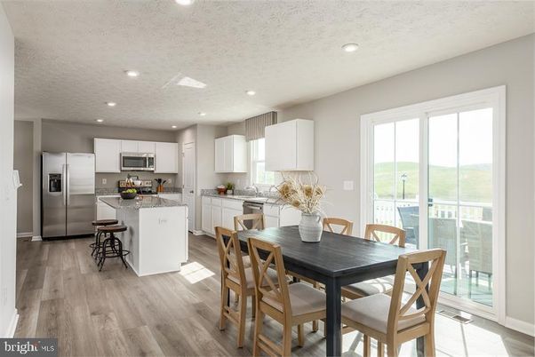 Dining room, Interior, Kitchen, Recessed Lighting, Stainless Steel Appliances, Wood Texture Flooring