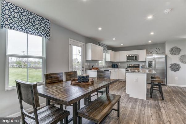 Dining room, Interior, Kitchen, Recessed Lighting, Stainless Steel Appliances, Wood Texture Flooring