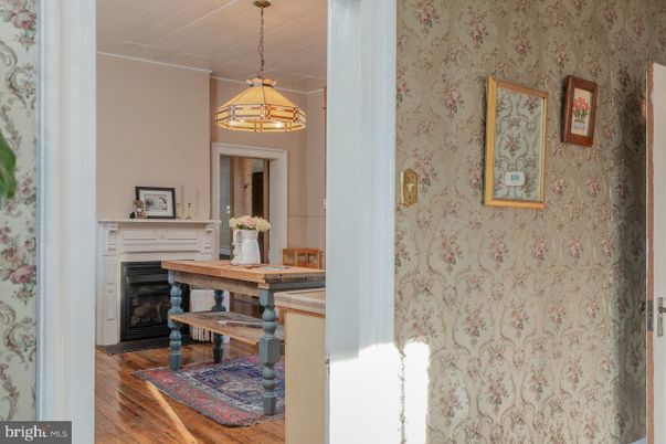 Dining room, Fireplace, Interior, Pendant Lights, Wood Texture Flooring