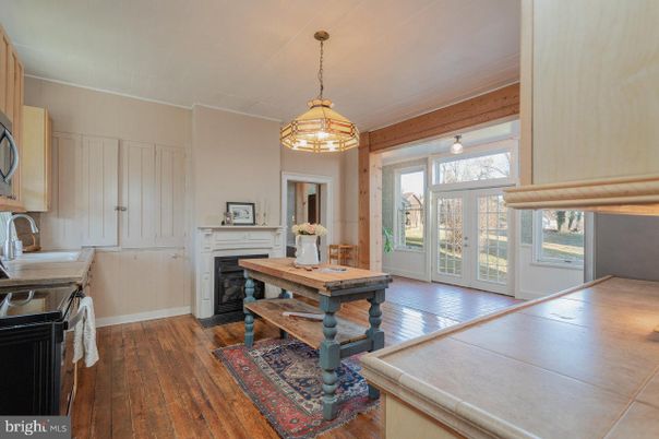 Dining room, Fireplace, Interior, Pendant Lights, Wood Texture Flooring