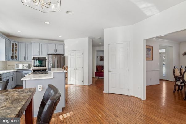 Dining room, Interior, Kitchen, Recessed Lighting, Stainless Steel Appliances, Wood Texture Flooring