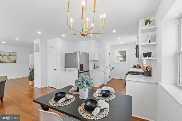 Chandelier, Dining room, Interior, Kitchen, Recessed Lighting, Stainless Steel Appliances, Wood Texture Flooring
