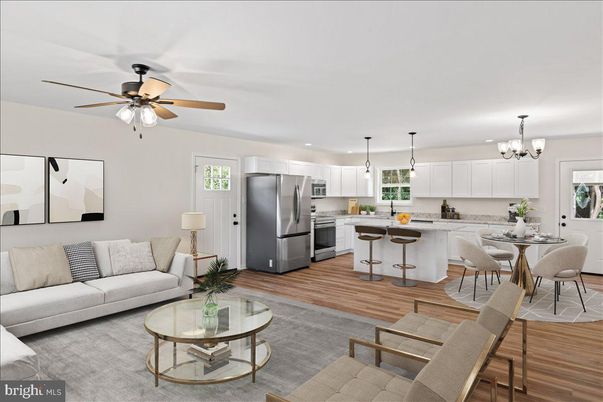 Chandelier, Dining room, Interior, Kitchen, Living room, Pendant Lights, Recessed Lighting, Stainless Steel Appliances, Wood Texture Flooring