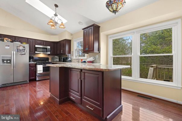 Chandelier, Interior, Kitchen, Pendant Lights, Stainless Steel Appliances, Wood Texture Flooring