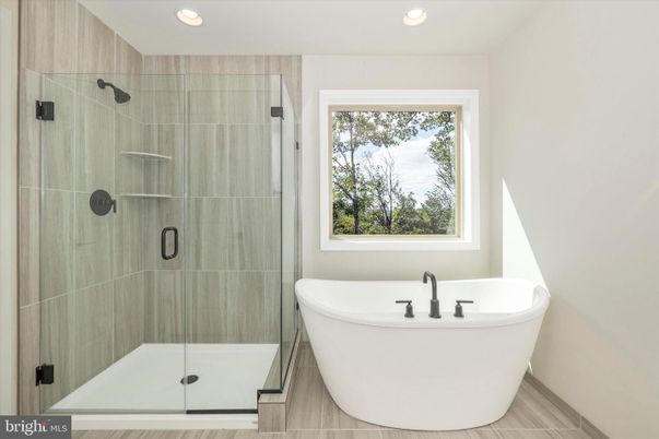 Bathroom, Free Standing Baths, Glass Shower, Interior, Recessed Lighting, Wood Texture Flooring