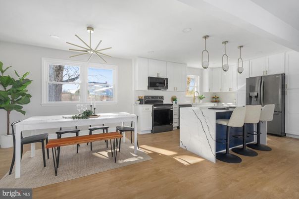 Dining room, Interior, Kitchen, Pendant Lights, Recessed Lighting, Stainless Steel Appliances, Wood Texture Flooring