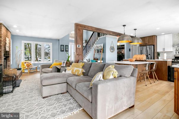 Dining room, Interior, Kitchen, Living room, Pendant Lights, Recessed Lighting, Stainless Steel Appliances, Stone Walls, Wood Texture Flooring