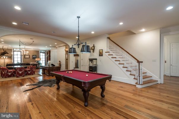 Billiard Table, Chandelier, Game Room, Interior, Pendant Lights, Recessed Lighting, Wood Texture Flooring