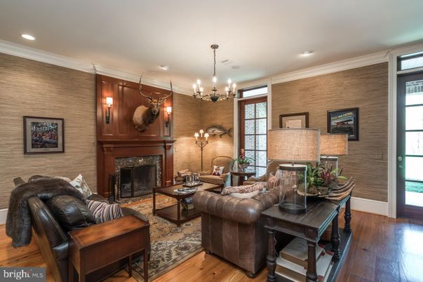 Chandelier, Fireplace, Interior, Living room, Recessed Lighting, Wood Texture Flooring, Wooden Walls