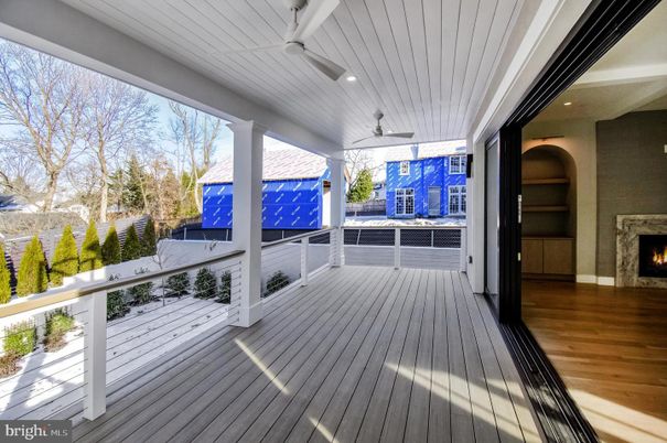 Exterior, Fireplace, Wood Texture Flooring