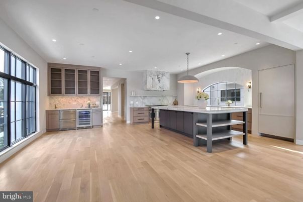 Interior, Kitchen, Marble Walls, Pendant Lights, Recessed Lighting, Stainless Steel Appliances, Wood Texture Flooring