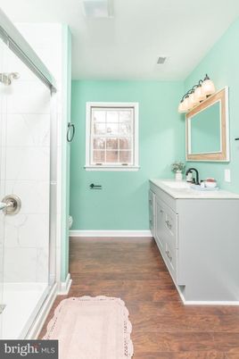 Bathroom, Glass Shower, Interior, Marble Walls, Wood Texture Flooring