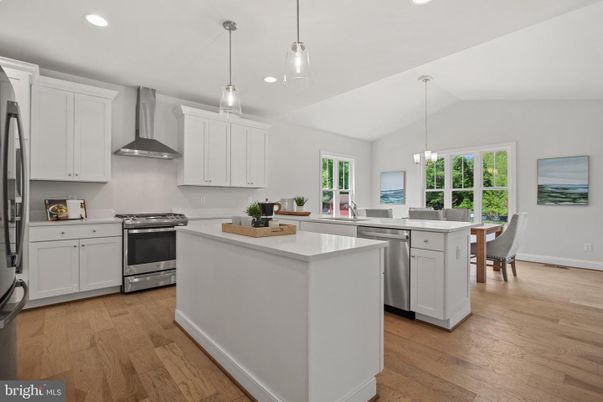 Dining room, Interior, Kitchen, Pendant Lights, Recessed Lighting, Stainless Steel Appliances, Wood Texture Flooring