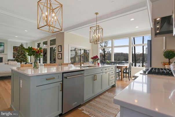 Chandelier, Dining room, Interior, Kitchen, Pendant Lights, Recessed Lighting, Stainless Steel Appliances, Wood Texture Flooring