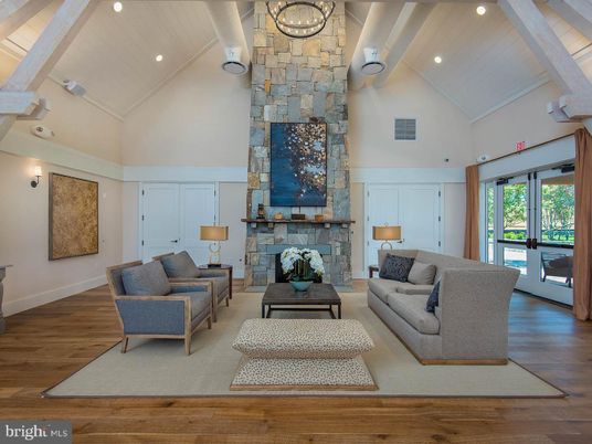 Fireplace, Interior, Living room, Recessed Lighting, Stone Walls, Wood Texture Flooring