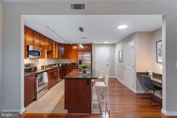 Dining room, Interior, Kitchen, Recessed Lighting, Stainless Steel Appliances, Wood Texture Flooring