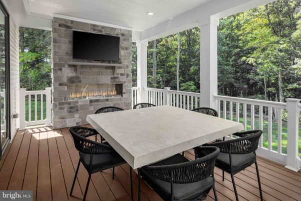 Exterior, Fireplace, Recessed Lighting, Wood Texture Flooring