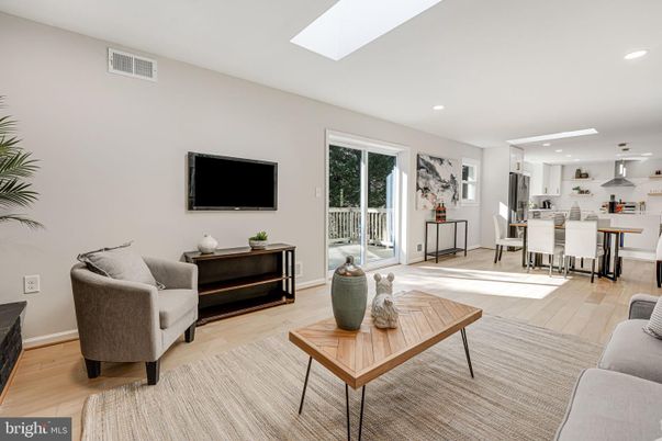 Dining room, Interior, Kitchen, Living room, Recessed Lighting, Stainless Steel Appliances, Wood Texture Flooring