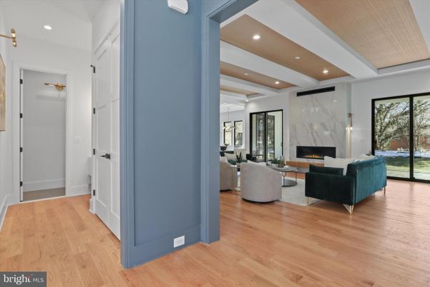 Fireplace, Interior, Living room, Marble Walls, Recessed Lighting, Wood Texture Flooring